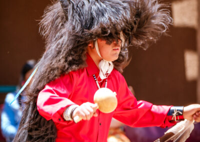 dancer at MMIP day wearing a headdress 2